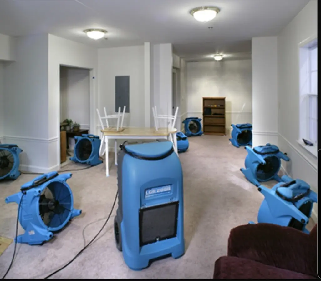 Air movers and dehumidifier setup for Water Damage Restoration in North College Hill